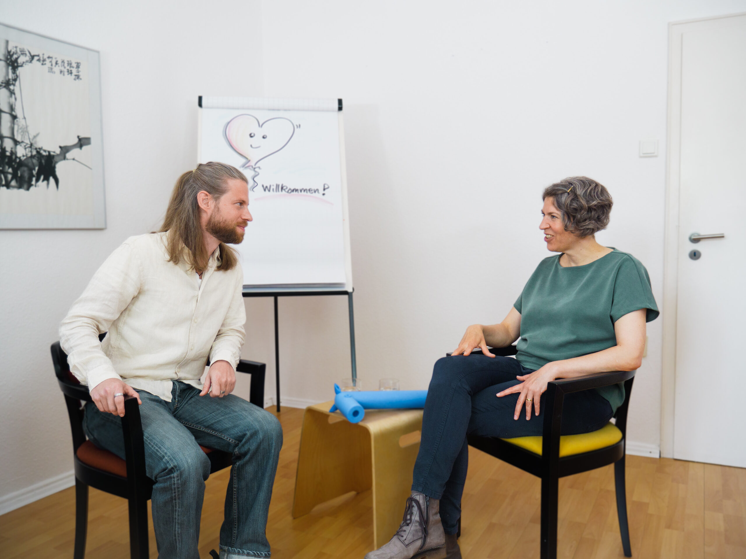 Coaching Das Bild zeigt Dennis Peterzelka in einer typischen Coaching Situation